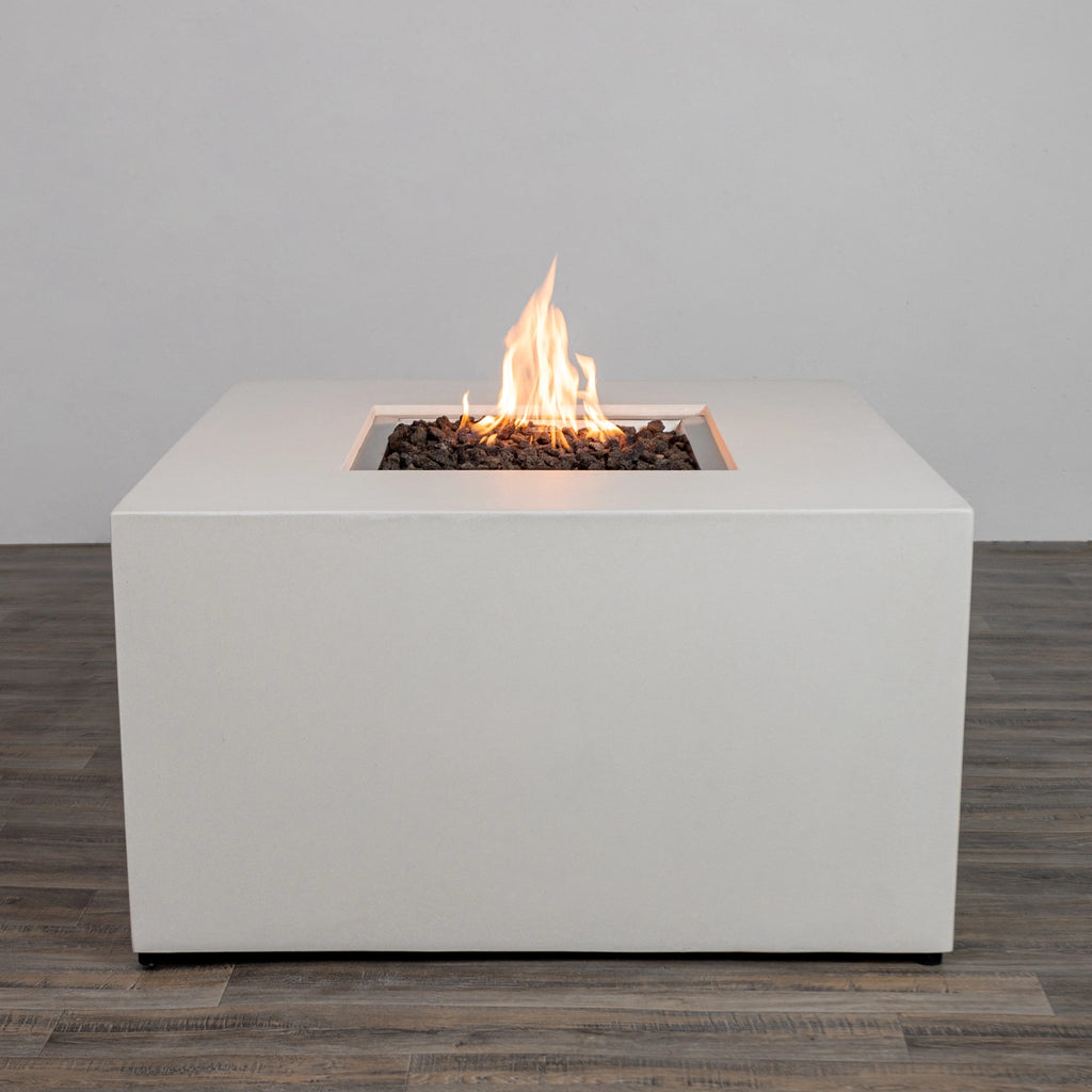 The Starfire Designs Beton 42" White Square Hidden Propane Tank Gas Fire Pit, showcasing a modern white concrete finish and robust flame for outdoor ambiance and warmth. 