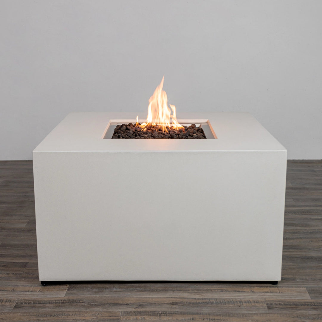 The Starfire Designs Beton 42" White Square Hidden Propane Tank Gas Fire Pit, showcasing a modern white concrete finish and robust flame for outdoor ambiance and warmth. 
