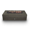 A front view of the Starfire Designs Concrete Rustic 60" x 32" Rectangle Gravity Gas Fire Pit in brown, featuring a vibrant flame display and natural lava rocks inside the burner tray. The brown concrete finish complements the modern outdoor space, providing a stunning focal point for evening gatherings. Its rectangular shape is both functional and stylish, offering a perfect mix of durability and design