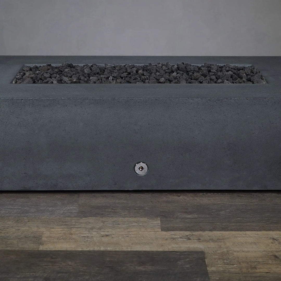 Front view of the Starfire Designs Concrete Rustic 72-inch x 38-inch Rectangle Gravity Gas Fire Pit in Graphite, showing the sleek, unlit fire pit ready to be the centerpiece of a stylish outdoor living area