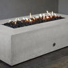 A detailed corner shot of the white Starfire Designs Concrete Rustic 72" x 38" Rectangle Gravity Gas Fire Pit, showing its clean edges and durable construction, ideal for contemporary outdoor spaces. Keywords: white corner view, concrete fire pit, modern gas fire pit, Starfire Designs, outdoor heating, rustic fire pit, durable design