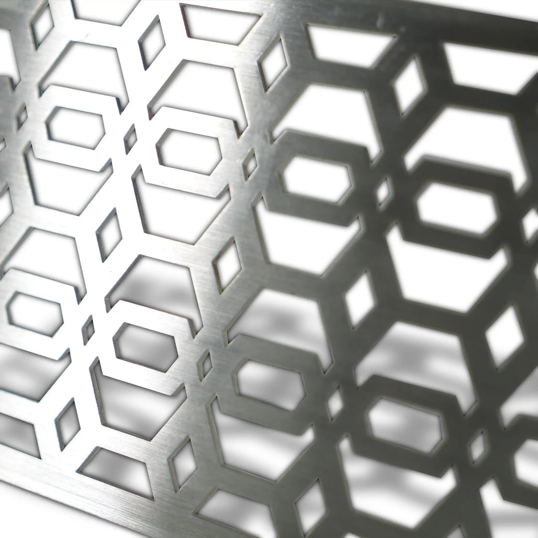 Side detail of the Starfire Designs Decorative Fire Pit Venting Panel - Arbor, showcasing the intricate arbor pattern in stainless steel. This panel is essential for safe ventilation in outdoor gas fire pits and large backyard fire pits