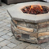 Lifestyle image showcasing the Starfire Designs Mason Venting Panel in use within an outdoor stone fire pit setup. The panel provides essential ventilation for natural gas fire pits, while its modern design complements the overall aesthetic of the fire pit, making it an ideal addition to any backyard fire pit installation