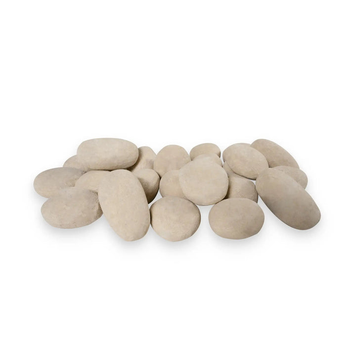 A collection of 24 beige-colored fire pebbles arranged in a random pile, featuring a natural stone-like appearance. These ceramic fire pebbles are designed for outdoor fire pits, adding a soft, organic touch to the fire pit's aesthetic. Ideal for use in modern and contemporary outdoor spaces, these heat-resistant fire pebbles are durable and enhance the overall look of fire feature