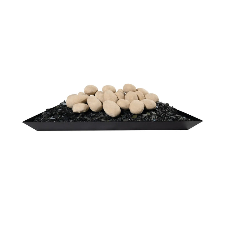 A tray filled with 24 beige fire pebbles arranged neatly on a bed of black fire glass, creating a striking contrast. These ceramic fire pebbles are designed for use in outdoor fire pits, adding a natural and elegant look to the fire feature. The smooth surface and uniform shape of the pebbles make them perfect for modern fire pit designs