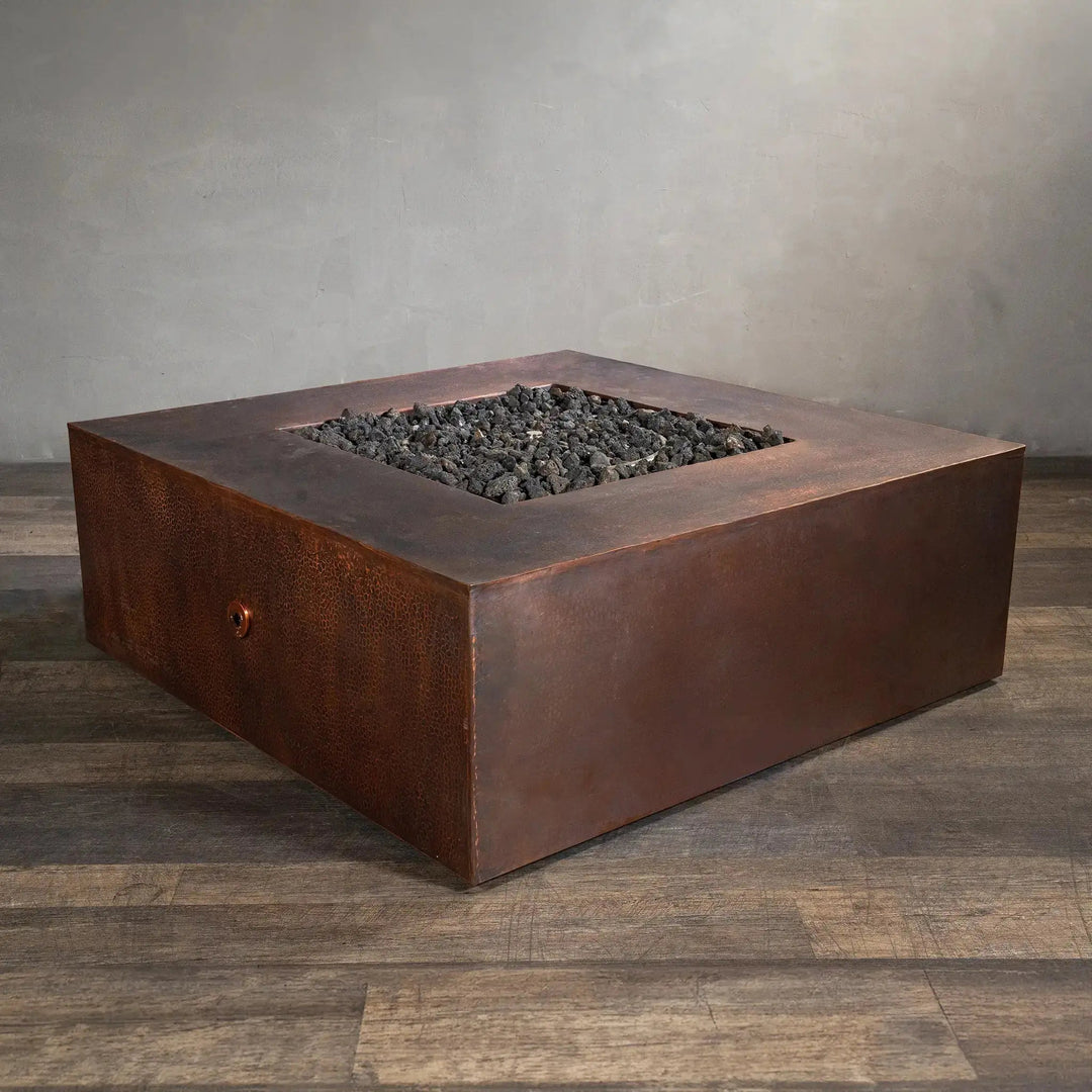 Modern 45-inch square copper fire pit from Starfire Designs, part of the Gravity Moreno series, featuring a sleek design with lava rocks, ideal for outdoor firepit settings in large backyards