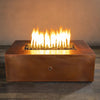 Luxury outdoor fire pit by Starfire Designs, featuring the Moreno rectangular fire pit in copper finish, measuring 48 inches by 32 inches, perfect for modern outdoor spaces. This natural gas fire pit creates a stunning flame display, ideal for enhancing backyard ambiance