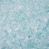 Close-up of Starfire Glass 1/2" Broken Fire Glass in Clear finish, displaying pristine transparent glass pieces. This premium fire glass enhances natural gas or propane fire pits, offering a clean and sophisticated look for modern outdoor spaces.

