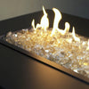 Starfire Glass 1/2" Broken Gold Reflective Fire Glass (10lbs) inside a modern gas fire table, adding a luxurious golden shine to any luxury fire pit, gas firepit, or fire pit table propane.