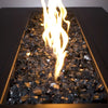 Starfire Glass 1/2" Broken Gray Reflective Fire Glass (10lbs) offering a sleek, contemporary look inside an outdoor gas fire pit. The neutral gray tones reflect the fire beautifully, making it ideal for modern outdoor fire pits.