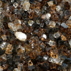 A close-up of Starfire Glass 1/2" Broken Pre-Mixed Fire Glass in Egyptian Gold, highlighting its dazzling mix of gold, silver, and clear reflective glass pieces. This luxury fire pit glass is designed to elevate fire tables, fire bowls, and outdoor gas fireplaces, reflecting intense heat and shimmering flames.