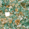 A detailed close-up of Starfire Glass 1/2" Broken Pre-Mixed Fire Glass in Emerald Elegance, featuring a mix of emerald green, blue, and clear reflective glass pieces. Ideal for gas fire pits, fire tables, and modern fireplaces, this glass provides vivid color and stunning light reflection.