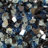 Close-up view of Starfire Glass 1/2" Broken Pre-Mixed Fire Glass in Ocean Deep. This stunning mix features deep blue, black, and clear glass pieces, offering a modern and elegant touch to any fire pit, fireplace, or fire bowl. The reflective surface enhances the flickering flames, creating a captivating outdoor fire experience.