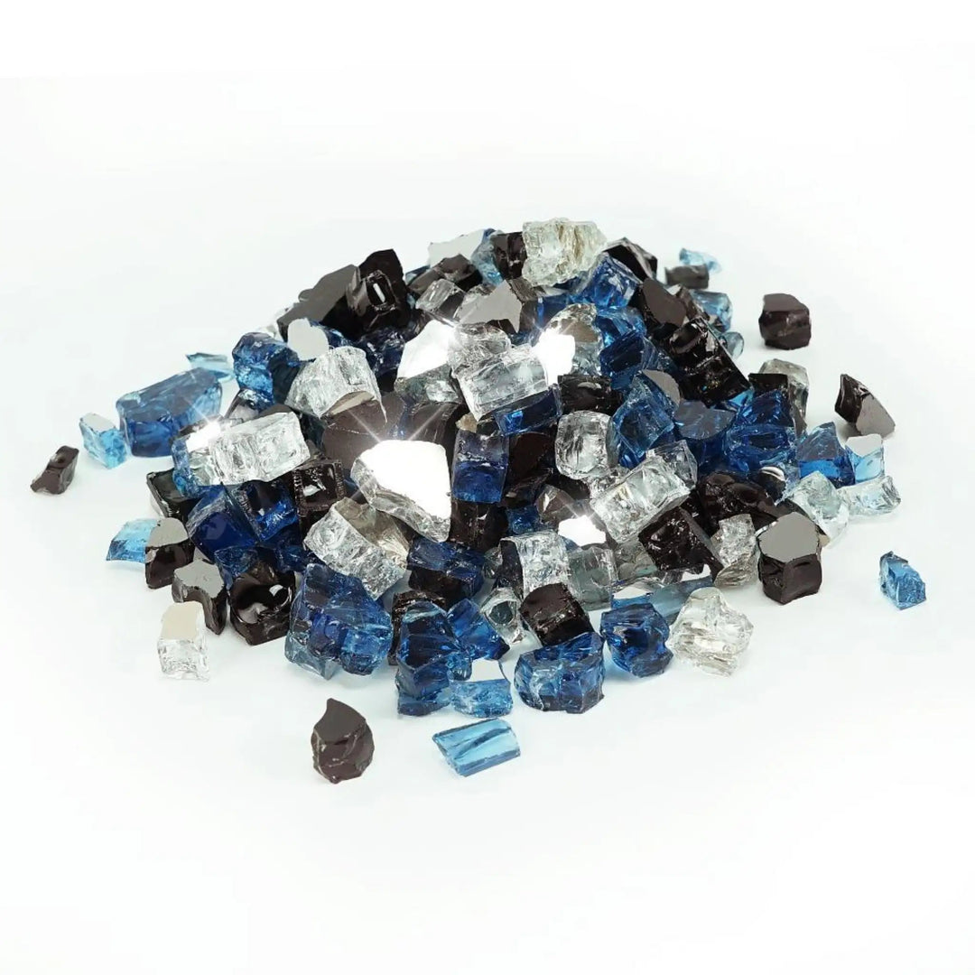 A loose pile of Starfire Glass 1/2" Broken Pre-Mixed Fire Glass in Ocean Deep, showcasing a blend of deep blue, black, and transparent reflective pieces. Ideal for fire pits, fire tables, and gas fireplaces, this high-quality glass enhances flame performance and adds a luxurious touch to outdoor and indoor spaces.