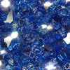 Detailed view of Starfire Glass 1/4" Broken Fire Glass in Cobalt Reflective. Its deep blue hue and sparkling reflective surfaces bring a striking elegance to outdoor fire pits, backyard fire tables, or gas fire features. Highly durable and heat resistant for all seasons.