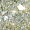 A detailed close-up of Starfire Glass 1/4" Broken Fire Glass in Gold Reflective. Its bright golden hues and sparkling reflective surfaces make it a standout choice for luxurious fire pits, gas fire tables, and outdoor fire bowls, offering durability and heat efficiency.