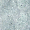 High-resolution image of Starfire Glass 1/4-inch broken fire glass in ultra-clear reflective finish, highlighting its brilliance. Designed for fire pit tables, natural gas or propane fire pits, and outdoor ambiance creation.