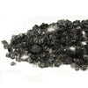 Starfire Glass 1/4-inch Broken Fire Glass in Gray Reflective, with a sleek and modern aesthetic that features reflective gray tones. A versatile fire media option for contemporary and minimalist fire feature designs.