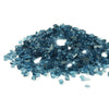 Starfire Glass 1/4-inch Broken Fire Glass in Pacific Blue Reflective, offering a deep and vibrant blue shade with reflective highlights that enhance the glow of flames. An eye-catching fire media for outdoor and indoor fire pits