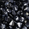Detailed close-up of Starfire Glass Reflective Fire Diamonds in deep black, featuring a glossy and highly reflective surface. These fire glass pieces create a modern, sleek look for any outdoor fire pit or gas fireplace, offering a bold contrast with flickering flames.