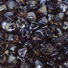 Close-up view of Starfire Glass Reflective Fire Diamonds in warm bronze, with a lustrous, high-gloss finish. These fire pit glass gems are perfect for enhancing fire bowls, fire pits, and fireplaces, creating a cozy and elegant atmosphere.