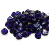 A pile of Starfire Glass Reflective Fire Diamonds in Cobalt Blue, offering a deep, intense shade that enhances outdoor fire tables and patio fire pits. Their high-shine finish maximizes light reflection, delivering a luxury fire pit media experience.