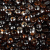 Close-up of Starfire Glass Reflective Fire Drops in Copper (10lbs), showcasing rich, amber-brown, glossy fire glass designed for fire pits, fire tables, and outdoor fireplaces to create a warm and elegant flame reflection.