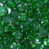 Detailed close-up of Starfire Glass Reflective Fire Drops in Emerald Green (10lbs), with vibrant green, smooth, and highly polished tempered fire glass, ideal for outdoor gas fire pits, modern fire features, and luxury fire bowls.