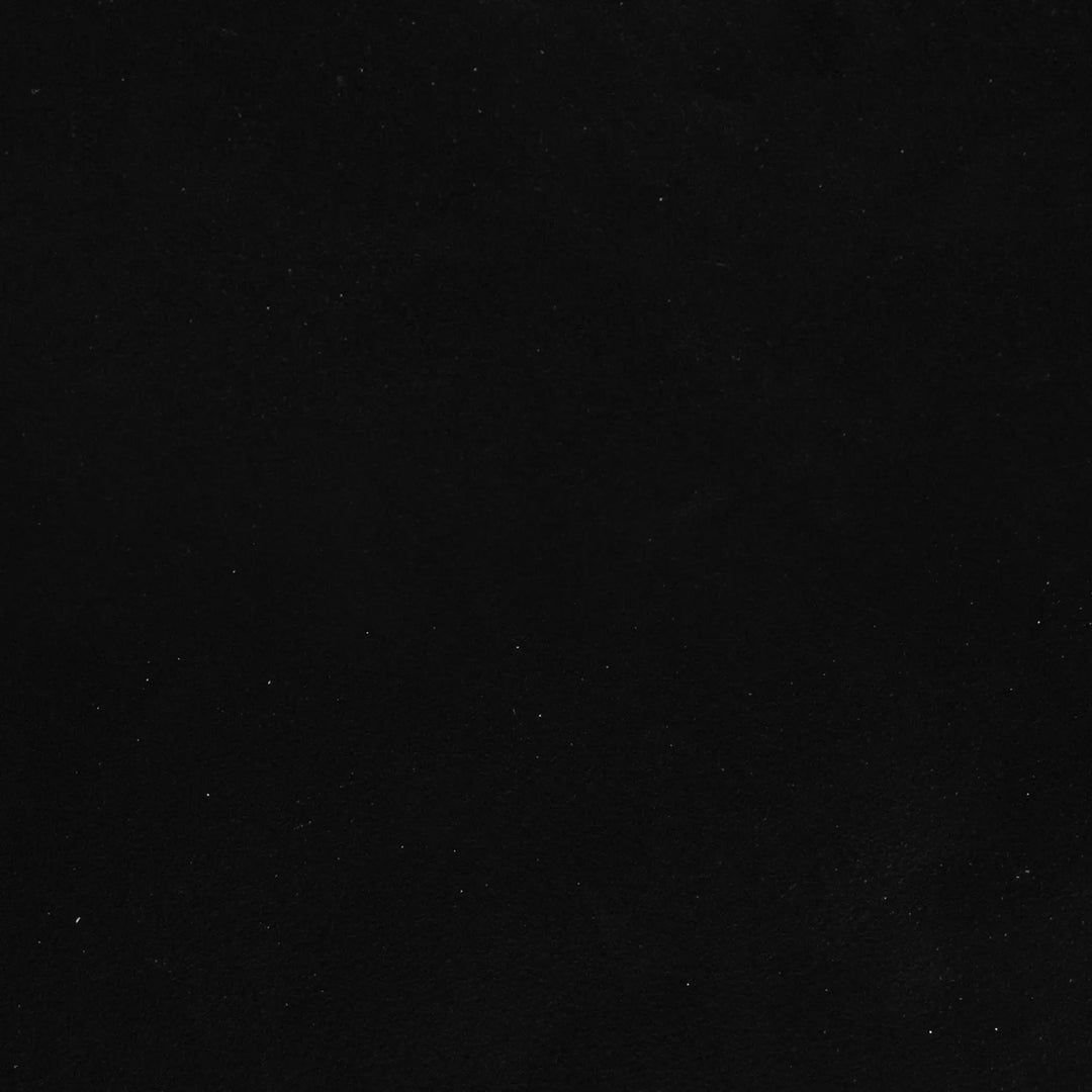  Detailed shot of the black hammertone surface texture on the Steel Mill 48-inch by 32-inch Rectangle Gas Fire Pit, highlighting the durable and sleek finish