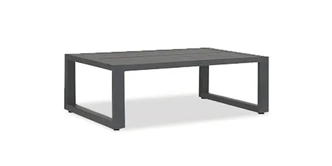 Sleek rectangular outdoor coffee table with a minimalist design, perfect for modern patio and outdoor living spaces