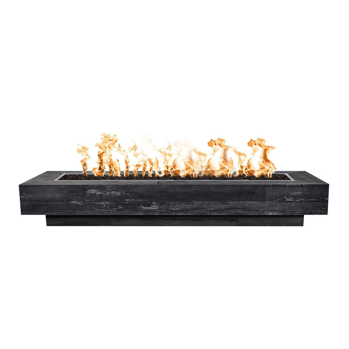 The Outdoor Plus 108-inch Coronado Wood Grain Concrete Gas Fire Pit in Ebony with front view showing realistic wood grain texture and a full-length rectangular fire pit insert. The fire pit is lit, featuring bright yellow flames rising from a bed of black lava rocks. This modern, industrial-style outdoor fire pit combines the natural look of wood grain with durable concrete, ideal for patios and backyards. Perfect for luxury outdoor spaces, providing warmth and ambiance for gatherings
