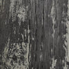 Close-up of the wood grain texture on The Outdoor Plus 108-inch Coronado Wood Grain Concrete Gas Fire Pit in Ebony finish. The detailed texture mimics real wood, offering an organic and rustic look while maintaining the durability of concrete. This high-end fire pit is ideal for modern outdoor designs, adding style and function to patios, backyards, and commercial outdoor spaces