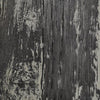 Close-up view of the wood grain texture on The Outdoor Plus 120-inch Coronado Gas Fire Pit in ebony finish. This image highlights the detailed and realistic wood grain pattern embedded in the durable concrete construction, enhancing the natural look and feel of the fire pit. Perfect for those seeking a modern, rustic aesthetic for their backyard fire pit setup or commercial outdoor spaces.