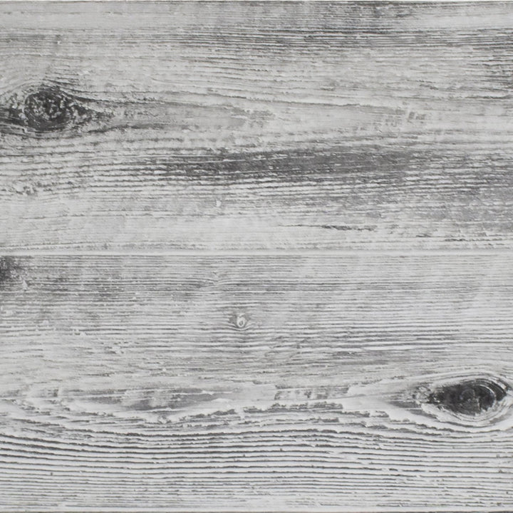 Close-up of The Outdoor Plus 120-inch Coronado wood grain concrete gas fire pit in ivory, showcasing the detailed wood grain texture in concrete. The realistic wood-like appearance is crafted to withstand outdoor conditions while maintaining a sophisticated and modern aesthetic, perfect for any luxury outdoor setting