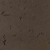 Close-up view of the chocolate-colored concrete swatch from The Outdoor Plus 24-inch Round Cazo Fire and Water Bowl, with a rich earth-tone finish that brings warmth and elegance to outdoor fire and water elements. The surface texture provides both durability and aesthetic appeal