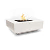 The Outdoor Plus 36" Cabo Square Concrete Gas Fire Pit in White Limestone finish. The fire pit showcases a clean, white limestone appearance, ideal for creating a bright and refreshing outdoor focal point. The recessed burner is filled with black lava rock, providing a stunning contrast that complements any modern or minimalist outdoor decor.
