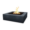 The Outdoor Plus 36" Quad Concrete Gas Fire Pit in slate, featuring a solid square design with a large fire basin filled with dark lava rocks. The slate finish provides a refined and modern look, suitable for minimalist outdoor spaces. Weather-resistant and durable, it's perfect for enhancing patios and gardens.