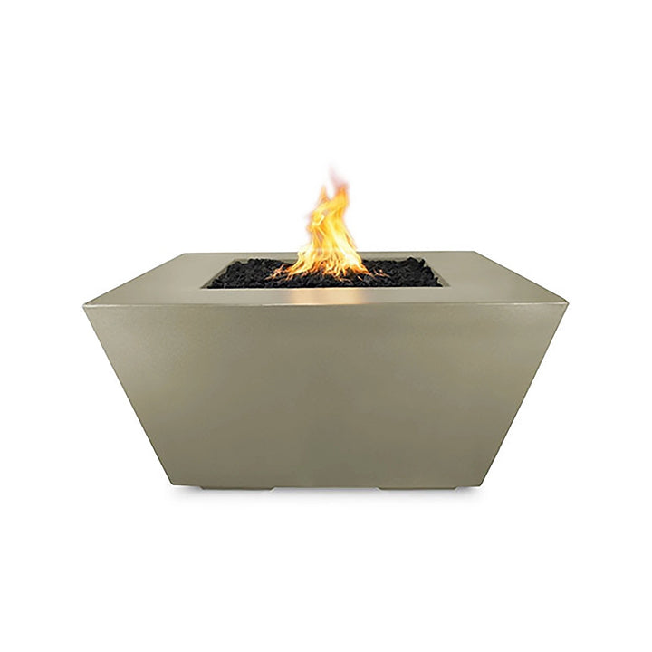 The Outdoor Plus 36" Redan Concrete Gas Fire Pit in ash color, featuring a sleek and modern trapezoidal design with a smooth concrete finish. This outdoor gas fire pit provides a contemporary ambiance for backyard spaces, highlighting the warm ash color, durability, and efficient heat distribution.