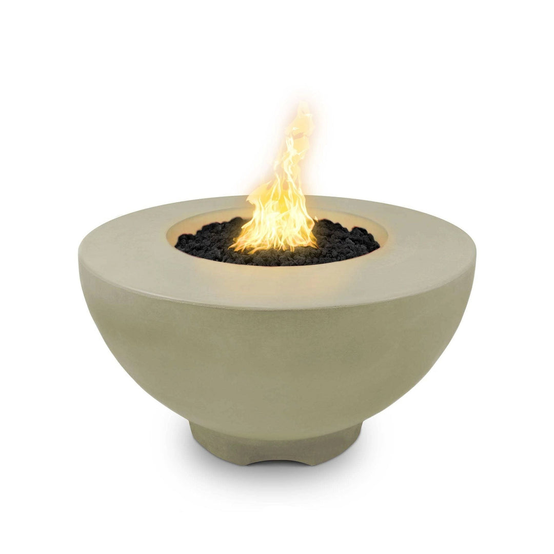 The Outdoor Plus 37" Sienna Concrete Gas Fire Pit in ash finish, showcasing its smooth concrete bowl design with a glowing flame at the center. This natural gas fire pit features durable construction for outdoor use, adding warmth and ambiance to any patio or backyard. Perfect for luxury fire pits, modern outdoor settings, and fire bowls for patios.