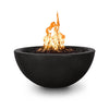 The Outdoor Plus 38-inch Luna Concrete Gas Fire Pit in black color, featuring a bold and minimalist design with a large flame rising from the center. The durable construction and modern look make it an excellent choice for contemporary outdoor spaces. Ideal for backyard gatherings, poolside installations, and luxurious outdoor living areas.