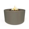 The Outdoor Plus 42" Chat Height Florence Concrete Gas Fire Pit in ash color. Featuring a smooth, minimalist cylindrical shape with an integrated burner and black lava rocks. This durable concrete fire pit is ideal for outdoor spaces, combining functionality with modern aesthetics