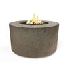 The Outdoor Plus 42" Chat Height Florence Concrete Gas Fire Pit in moss stone features a smooth surface and round design. This elegant fire pit creates a modern focal point in outdoor spaces, ideal for backyard gatherings. Perfect for those seeking durable concrete construction with a sleek look for their fire pit.