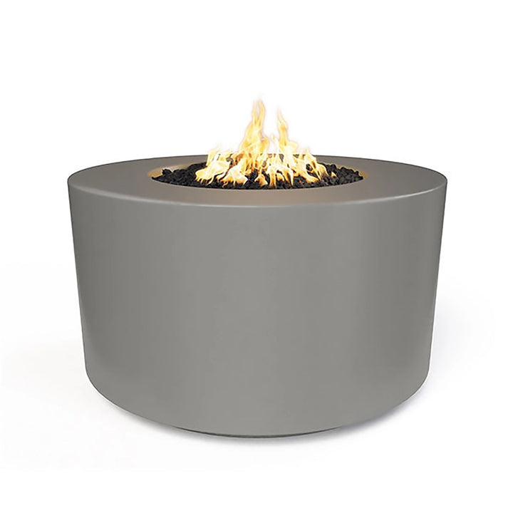 The Outdoor Plus 42" Chat Height Florence Concrete Gas Fire Pit in natural gray offers a subtle textured design that adds depth to outdoor spaces. Its rugged appearance combined with a classic round shape makes it perfect for modern and rustic outdoor settings alike. 