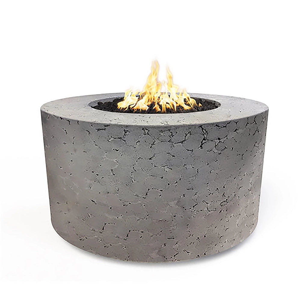 The Outdoor Plus 42" Chat Height Florence Concrete Gas Fire Pit in rustic gray features a distinctive cracked texture that gives it a weathered and natural look. This fire pit is a perfect fit for rustic outdoor environments, adding character and charm.