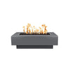 The Outdoor Plus 48-inch Coronado Steel Gas Fire Pit in Gray Powder Coated Steel finish, offering a sophisticated and contemporary appearance. This rectangular fire pit is designed to withstand harsh weather conditions, thanks to its protective powder coating. Its modern design and sleek lines make it a great addition to upscale residential or commercial outdoor areas, providing both warmth and visual appeal