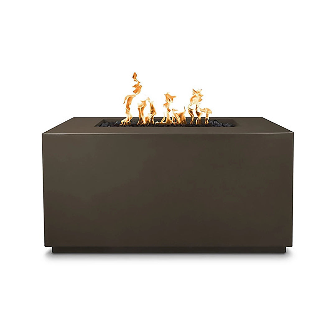 The Outdoor Plus 48-inch Pismo Concrete Gas Fire Pit in chocolate finish, showcasing a deep and rich color that adds a sophisticated touch to outdoor areas. This rectangular concrete fire pit includes a center burner filled with black lava rock, enhancing the visual appeal of the flickering flames. A durable and stylish choice for those looking to create an inviting atmosphere in their backyard. 