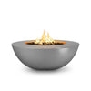 The Outdoor Plus 48" Sedona Wide Ledge Concrete Gas Fire Pit in Natural Gray finish, showcasing a modern and neutral aesthetic. The soft, polished texture combined with the large, round shape makes it a versatile centerpiece for any outdoor patio. Designed to withstand various weather conditions, this fire pit is built with high-quality concrete materials and finished in a natural gray hue to blend seamlessly with contemporary outdoor furniture. 