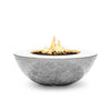 The Outdoor Plus 48" Sedona Wide Ledge Concrete Gas Fire Pit in Rustic White, featuring a rustic yet elegant design with a distressed white finish. The wide bowl shape and the rustic texture make this fire pit a perfect addition to cottage-style or shabby-chic outdoor spaces. Its weather-resistant concrete construction is built to endure varying conditions while providing a sophisticated focal point for patios and garden settings.