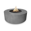 The Florence Concrete Gas Fire Pit in Natural Gray exudes a sleek and minimalistic charm with its smooth, neutral gray surface. The round fire pit presents an elegant contrast with the black lava rock and bright flames. Ideal for modern outdoor decor, commercial seating areas, or backyard retreats, this piece combines both style and functionality.