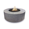 The Rustic Gray Florence Concrete Gas Fire Pit features a textured finish with a blend of gray hues, resembling aged stone for a rugged and natural appeal. The circular body frames a glowing flame bed of lava rocks. Ideal for rustic outdoor settings, modern farmhouse decor, and cozy backyard fire pit areas.